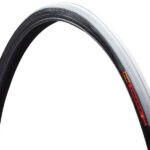 Side view of racer tire with black sidewall and herringbone tread