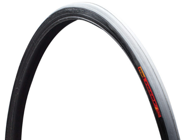 Side view of racer tire with black sidewall and herringbone tread