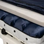 Foam insert sitting between air bladders and mattress cover