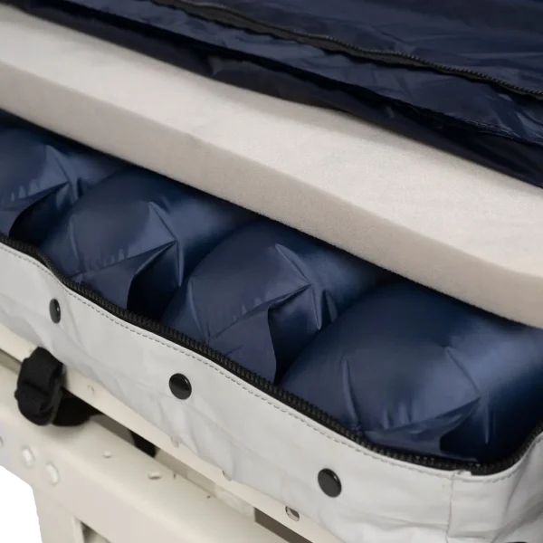 Foam insert sitting between air bladders and mattress cover