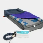 Mattress with cover pulled back displaying the air bladders