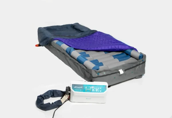 Mattress with cover pulled back displaying the air bladders