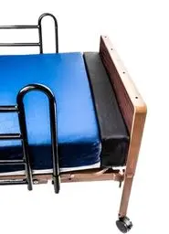 Showers mattress extender filling the gap between mattress and footboard