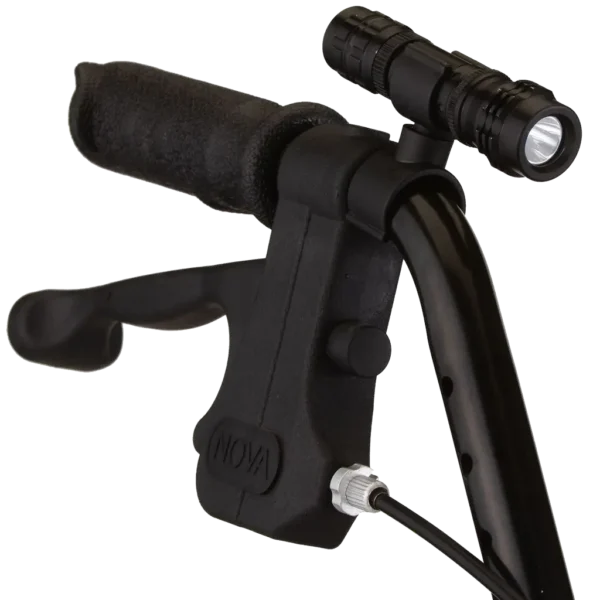 Flashlight attached near handle on rollator